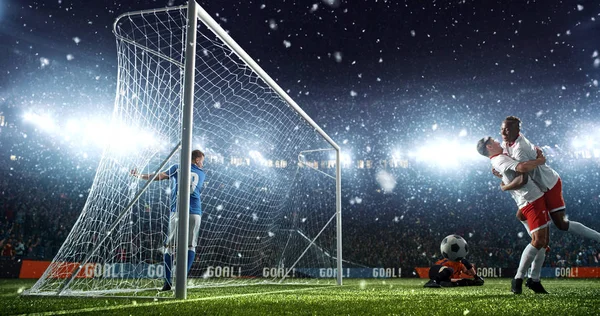 Intense soccer moment in front of the goal on the professional soccer stadium while it\'s snowing. Stadium and crowd are made in 3D.