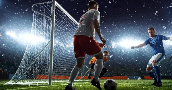 Intense soccer moment in front of the goal on the professional soccer stadium while it\'s snowing. Stadium and crowd are made in 3D.