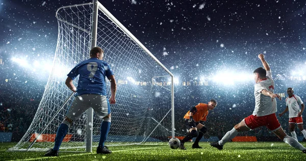 Intense soccer moment in front of the goal on the professional soccer stadium while it\'s snowing. Stadium and crowd are made in 3D.