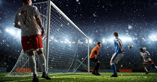 Intense soccer moment in front of the goal on the professional soccer stadium while it\'s snowing. Stadium and crowd are made in 3D.