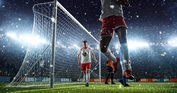 Intense soccer moment in front of the goal on the professional soccer stadium while it\'s snowing. Stadium and crowd are made in 3D.