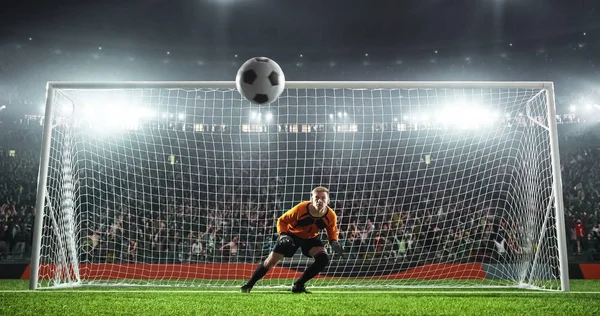 Soccer goalkeeper in action on the soccer stadium. He wear unbranded sports clothes. Stadium and crowd made in 3D.