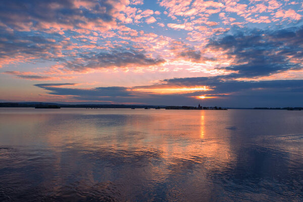 Lake landscape. Musov reservoir and the church of St. Linhart