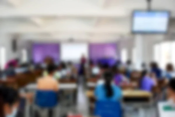 Blurred background of meeting room.