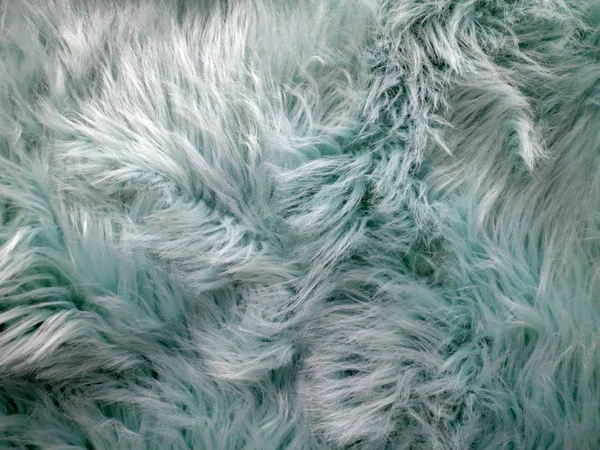 Imitation fur of bluish color with some and fluffiness. — Stock Photo, Image