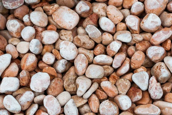 Background of small brown rocks Royalty Free Stock Images