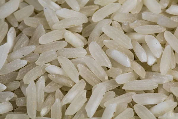 Textura de aproximação de grãos de arroz não cozidos — Fotografia de Stock