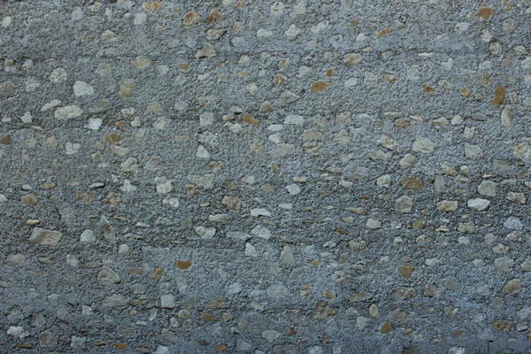 Büyük Doğal Taşlar Küçük Çakıl Taşlarıyla Duvar Arkaplan Dokusu — Stok fotoğraf