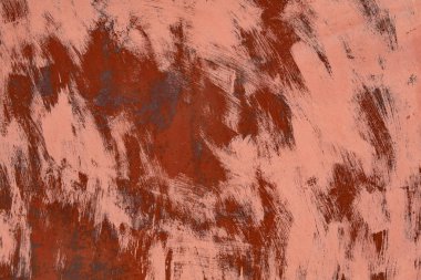 paslı metal yüzeylere fırça darbeleriyle kırmızı renkle boyanmış. arka plan veya zemin kadar yakın