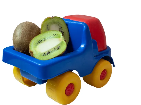Kleiner Spielzeugauto Lkw Mit Kiwifrüchten Exotische Fruchtlieferung Von Hinten Aufgenommen — Stockfoto