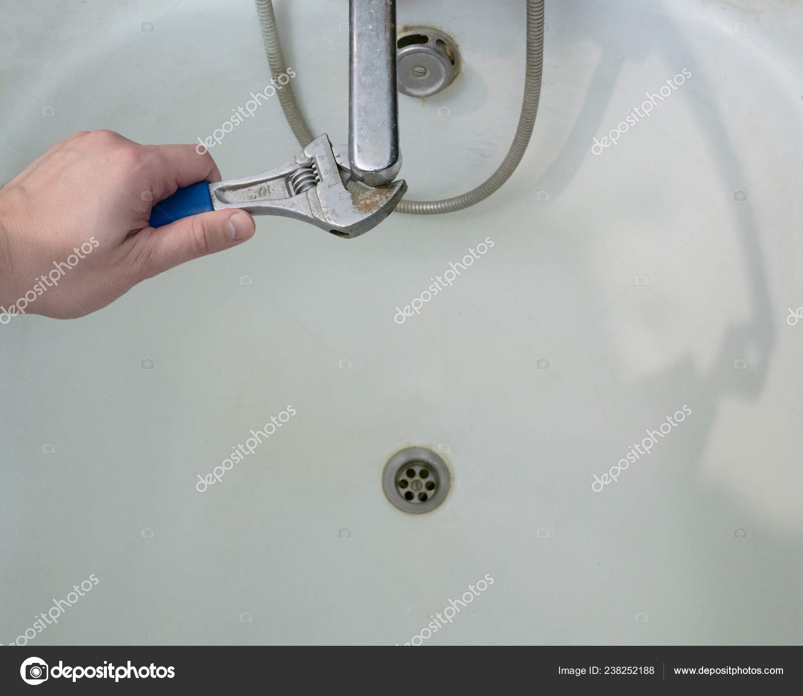 Closeup Plumber Wrench Fixing Faucet Bathtub Stock Photo C Pavel