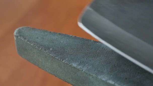 Macro Close Sharpening Butcher Chopping Knife Grindstone Looped Video Footage — Stock Video