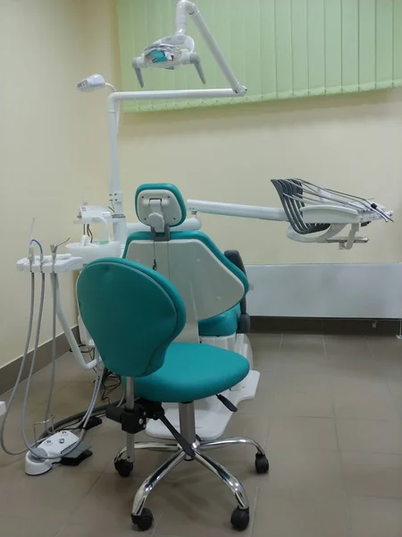 interior modern dentist cabinet with chair and professional equipment. nobody in image