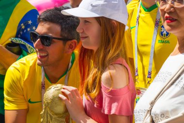 Russia, Moscow, June 26, 2018 - Brazilian fans on Nikolskaya street. World Cup 2018 in Moscow. clipart