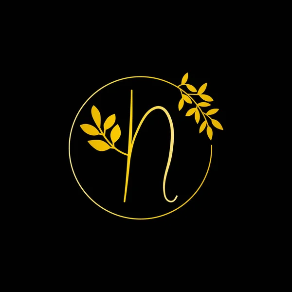 N Gold letter and Gold Leaf logo design. N Letter golden initial luxury Boutique Nature Floral Flower. N Monogram vector design concept and with leaf for fashion brand and luxuries business identity.