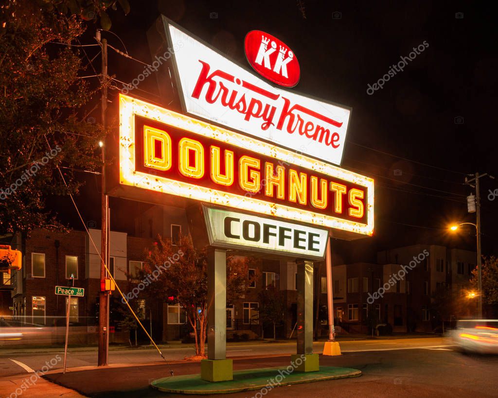 A view of the historic neon sign of original Krispy Kreme shop in Raleigh, North Carolina located on the on Person Street.