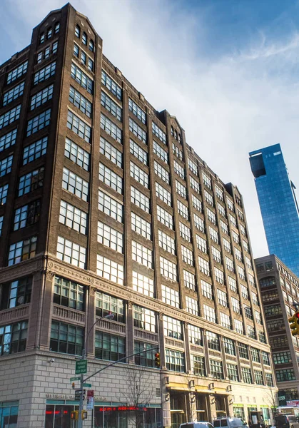 Portrait view of an office building in SoHo neighbor of New York City. Royalty Free Stock Images