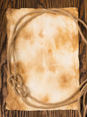 Eski kağıt arka planda eski bir ip