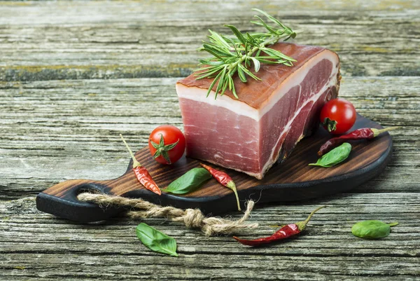 Delicious Smoked Ham Wooden Table Rosemary Pepper Cherry Tomatoes Top — Stock Photo, Image
