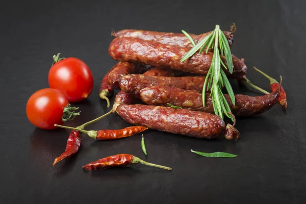 Smoked Sausage Rosemary Pepper Tomatoes Black Background — Stock Photo, Image