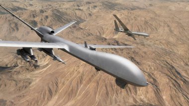 İki Uav dronu bir keşif görevinde çölün üzerinde uçuyor.