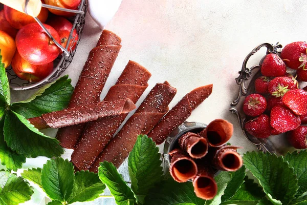 Strawberry pastille made of strawberries and apples on a white background. Health food. Copy space.The view from the top.