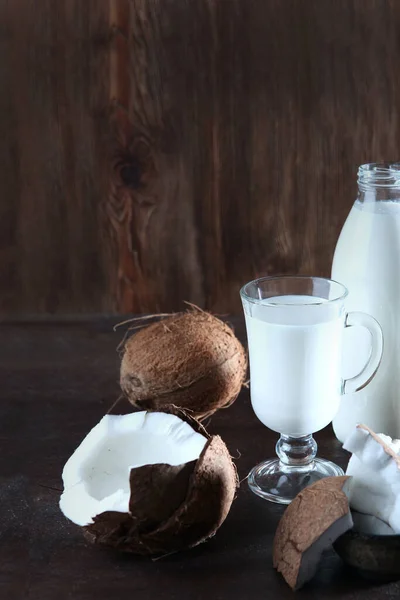 Milk Bottle Tall Glass Coconuts Dark Background Copy Space Vertical — Stock Photo, Image