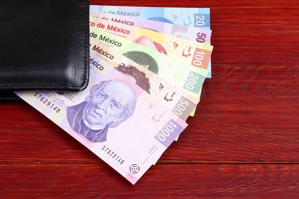M-cüzdanda bulunan siyah Meksika Pesos 