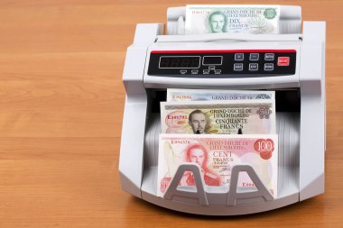 Luxembourg franc in a counting machine