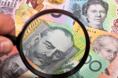 Büyüteçteki Avustralya doları bir iş geçmişi
