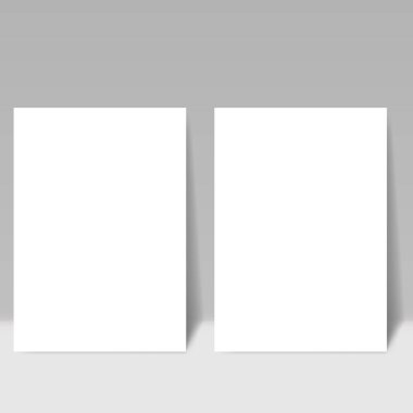 Gri arkaplanda boş kağıt sayfası. 