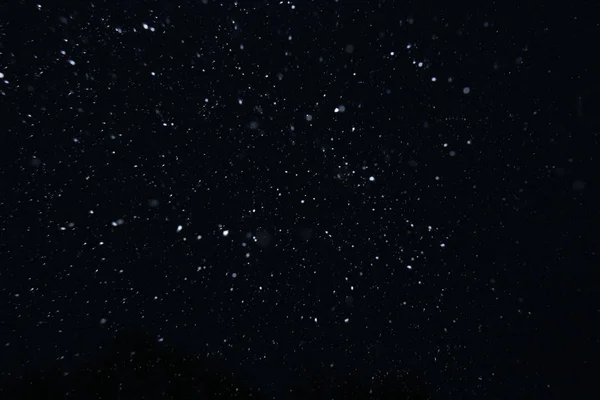 Nahaufnahme Hintergrund Textur Von Schneeflocken Bei Schneefall Auf Schwarzem Hintergrund — Stockfoto