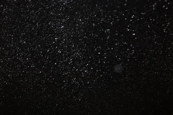 Nahaufnahme Hintergrund Textur Von Schneeflocken Bei Schneefall Auf Schwarzem Hintergrund — Stockfoto