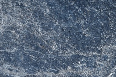 Güneş ışığında izole edilmiş makro doku kıyı kayalıkları