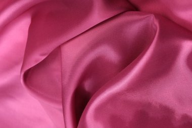 Saten kumaş fuşya renk stüdyosunun makro dokusu