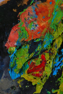 makro ressamın paleti, dokusu farklı renklerde ve doygunluk stüdyosunda karışık yağlı boya.