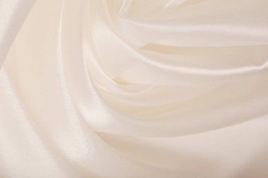 Saten kumaşın makro dokusu şampanya renkli stüdyo