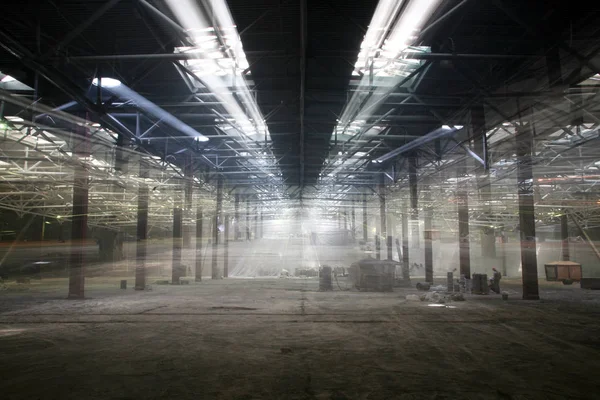 industrial interior of an abandoned building and repair work on the initial stage