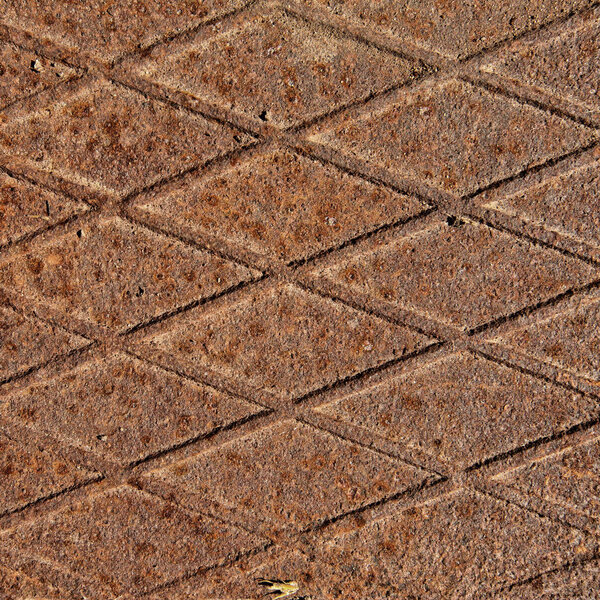 макроизолированная текстура ржавого листового металла в солнечном свете