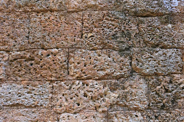 Achtergrond textuur van een zeer oude steen — Stockfoto