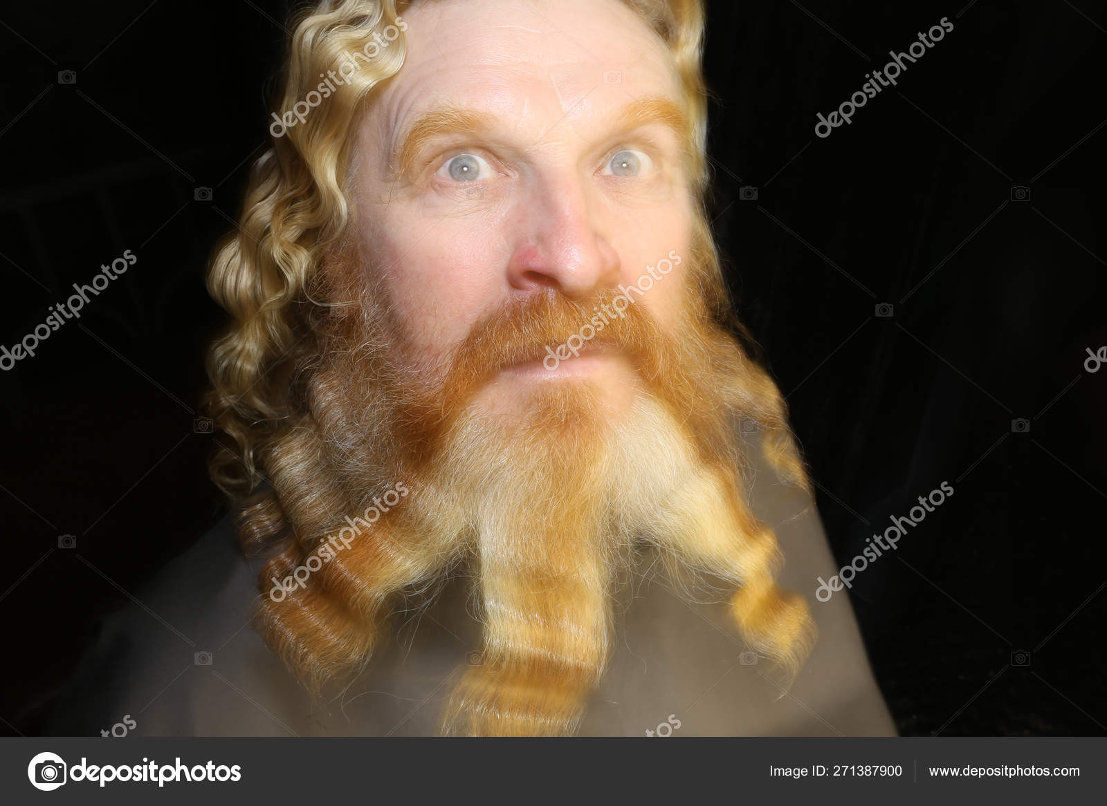 Adult Red Haired Man With Long Wavy Hair And Beard Stock Photo