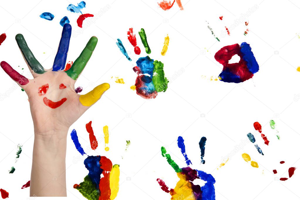Children's smiling colorful hands raised up. The concept of clas