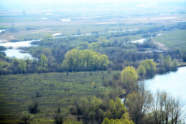 Spring landscape of the river, fields and trees in the vicinity of Yelabuga, top view