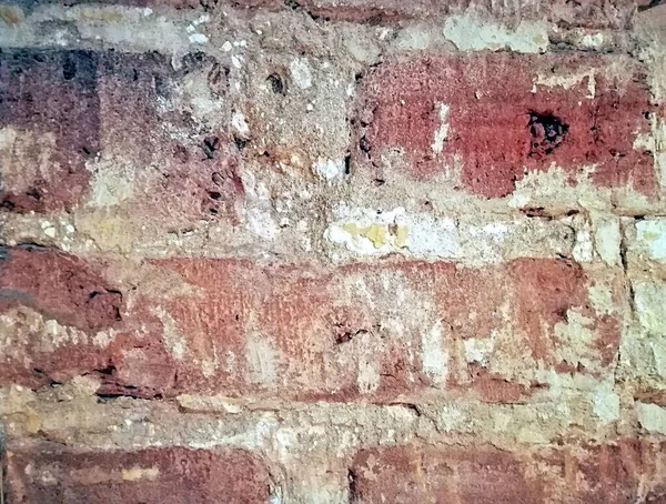 Beyaz ve kırmızı tuğlalı eski tuğla duvar parçası