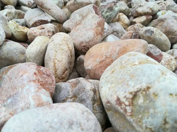 Stone texture of large pieces of marble, granite and pebbles Closeup — ストック写真