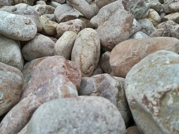 Textura de piedra de grandes piezas de mármol, granito y guijarros Primer plano —  Fotos de Stock