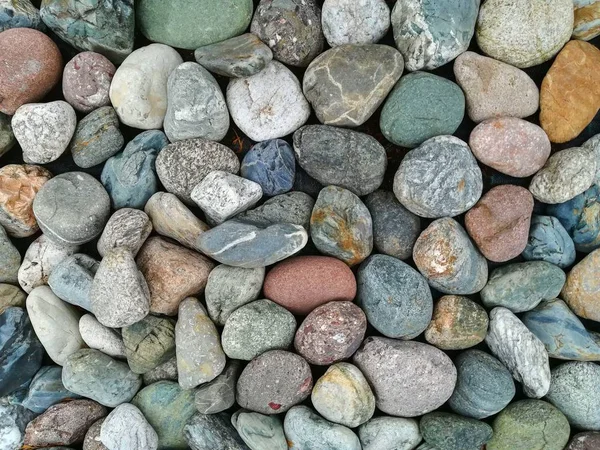 Stenen textuur van grote stukken marmer, graniet en kiezelstenen Closeup — Stockfoto