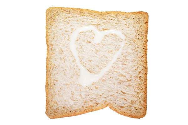 Een Sneetje Volkoren Brood Met Hartvorm Van Gezoete Gecondenseerde Melk — Stockfoto