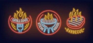 Barbekü, ızgara barı ve 2 numaralı et lokantasının neon işaretleri.