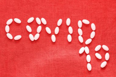 Diyet beslenme kapsülleriyle yazılmış covid 19 kelime